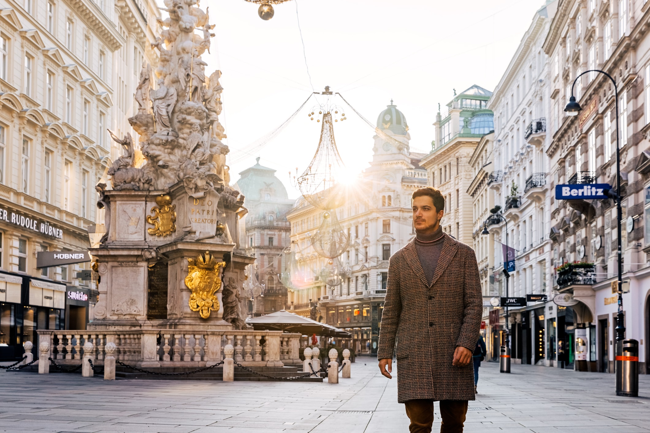 man standing in city